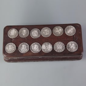 GROUP OF TWELVE SMALL CHINESE COIN