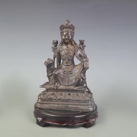 A FINELY CARVED GUAN YIN BRONZE STATUE
