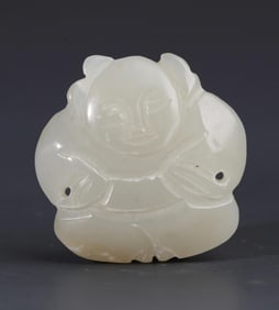 A FINE PALE CELADON JADE BOY FIGURE PENDANT
