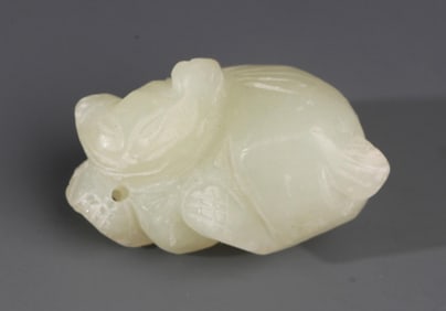 A FINE PALE CELADON JADE IN FIGURE OF RUI SHOU