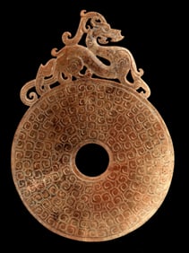 A FINE DRAGON PATTERN ROUND JADE PENDANT