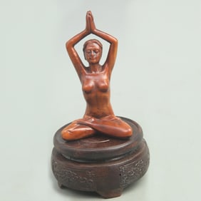 HUANGYANG WOOD FIGURINE OF A BEAUTIFUL WOMAN