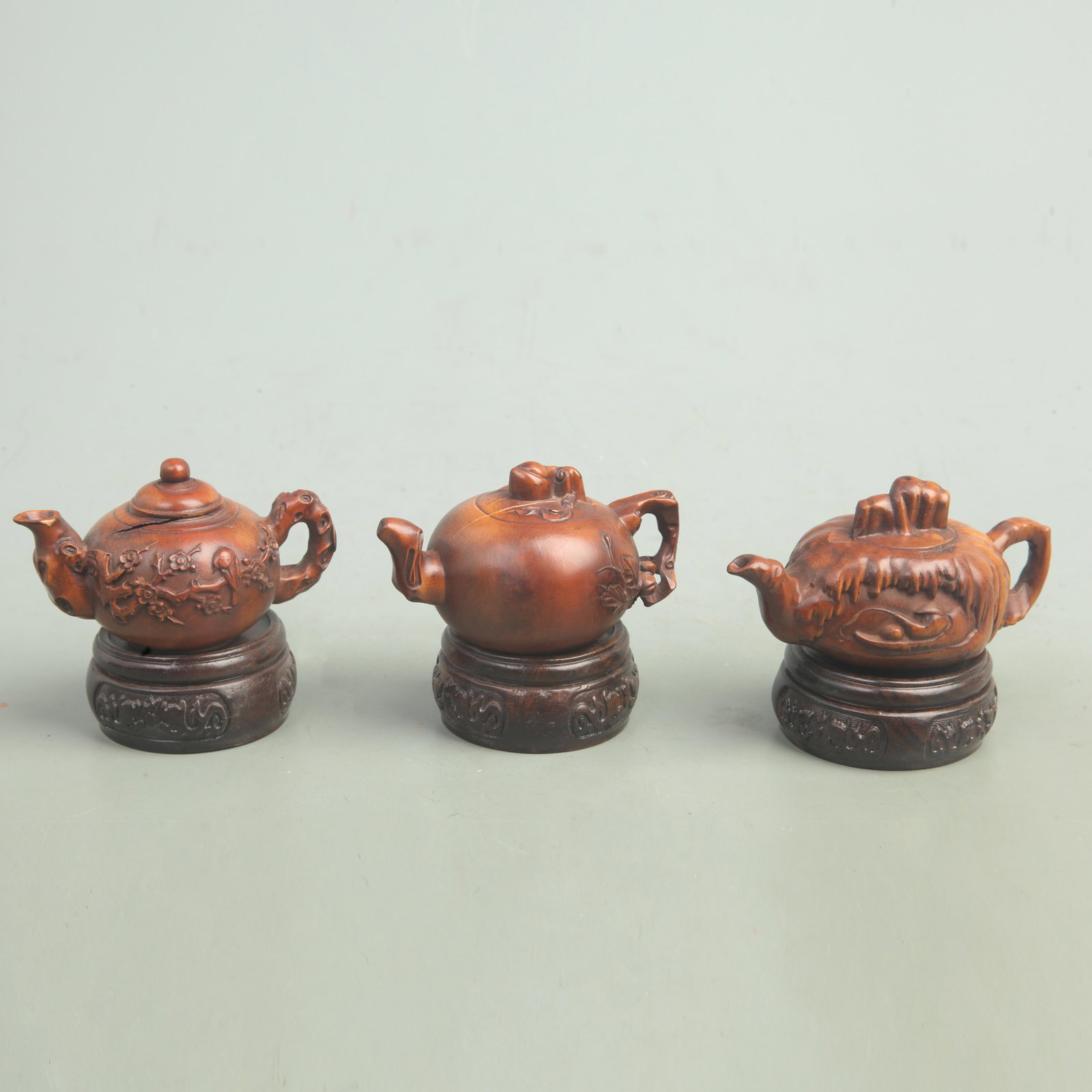 GROUP OF THREE SMALL BOXWOOD MADE TEAPOT: Qing Dynasty; Size Varies
