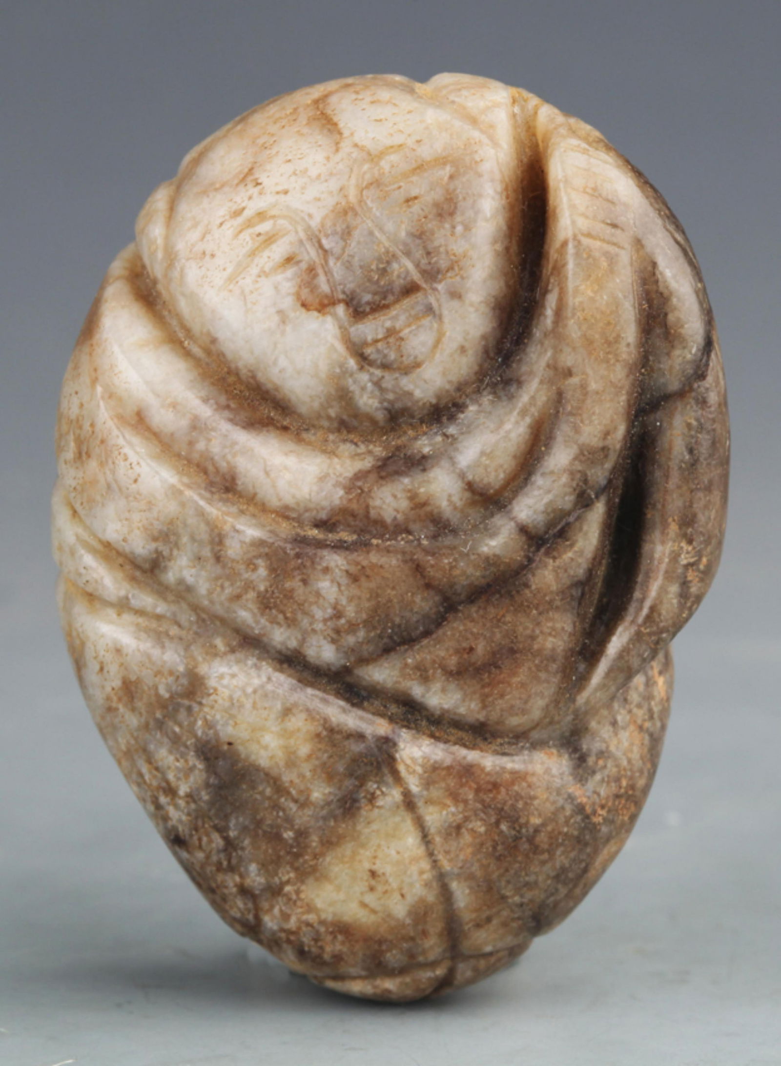 A FINE WHITE JADE IN FIGURE OF BOY (1 of 3)