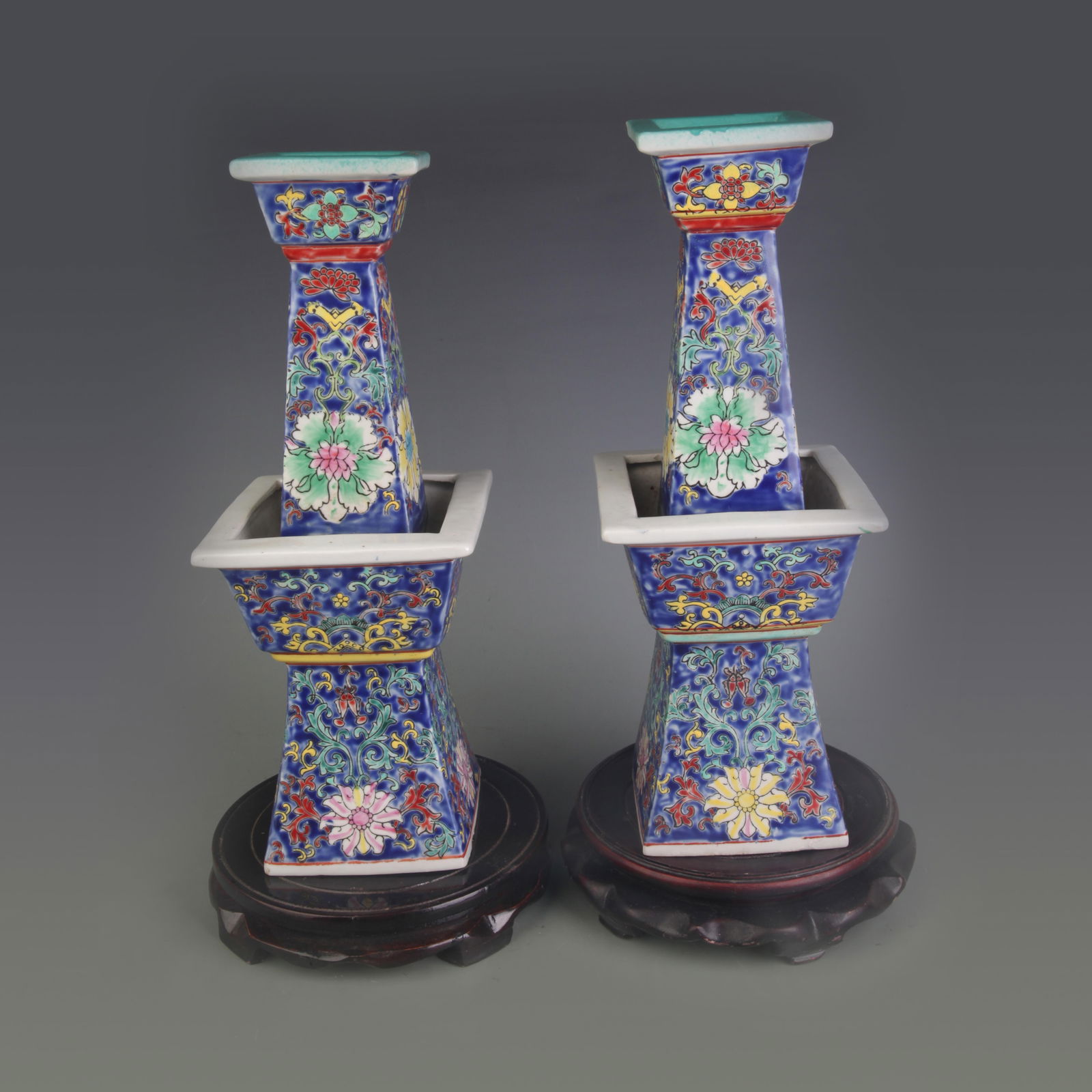 PAIR OF FAMILLE ROSE CANDLE HOLDERS WITH BLUE GROUND AND FLORAL MOTIFS (1 of 6)