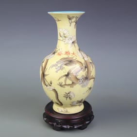 FAMILLE ROSE YELLOW GROUND DRAGON VASE WITH FLORAL DESIGN