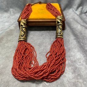 A FINE SMALL RED CORAL MADE NECKLACE