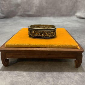 A FINE WHITE BRONZE MADE BRANGLE