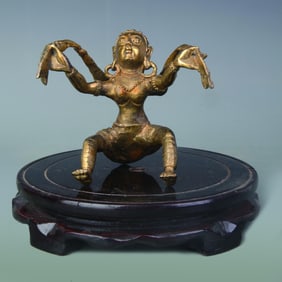 A FINE GILDED TIBETAN BUDDHIST STATUE