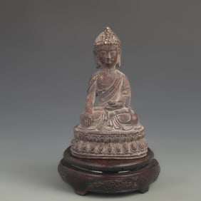 A BRONZE STATUE OF SHAKYAMUNI BUDDHA