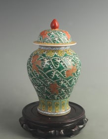 FAMILLE ROSE GREEN GROUND GENERAL JAR WITH SEA AND FISH MOTIFS