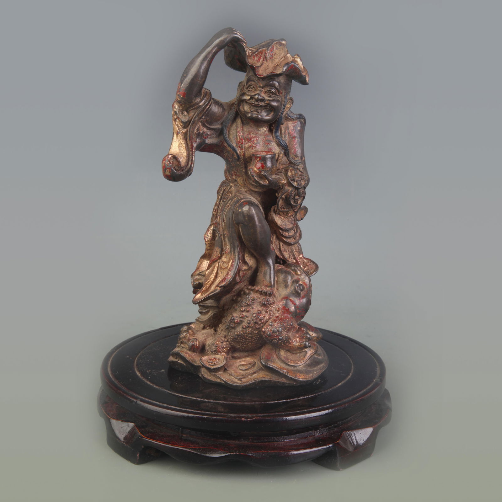 A FINE BRONZE LIU HAI AND GOLDEN TOAD STATUE: Qing Dynasty; Width: 4.1 inch; High: 7.9 inch;
