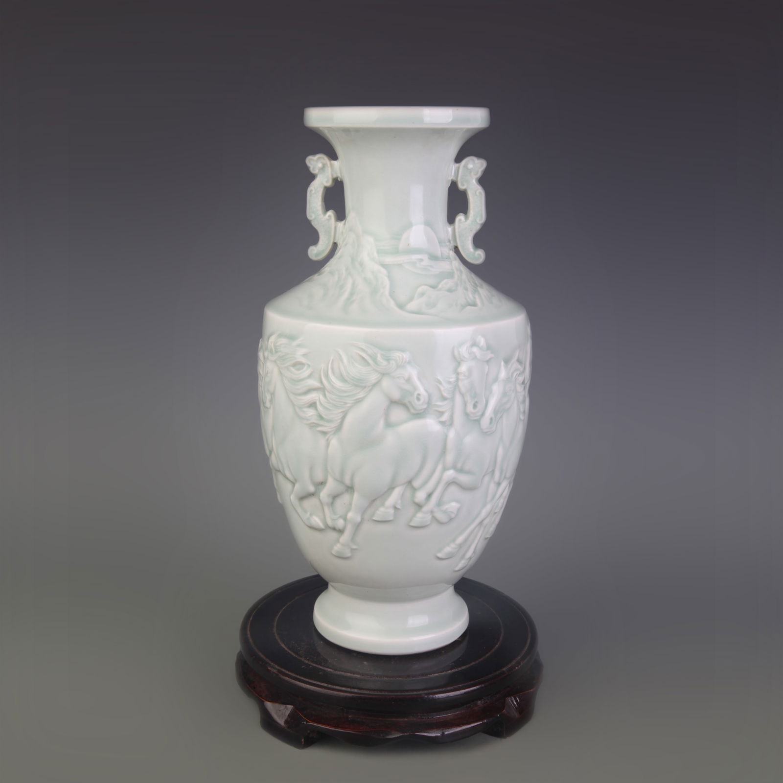 CELADON GLAZED AND CARVED "EIGHT HORSES" TWIN-HANDLED VASE (1 of 5)