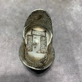 YUAN BAO SHAPED WHITE BRONZE PAPERWEIGHT