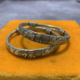 PAIR OF WHITE BRONZE BANGLE