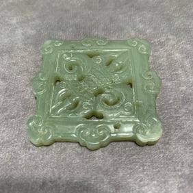 HETIAN GREEN-WHITE JADE VAJRA PATTERN PENDANT