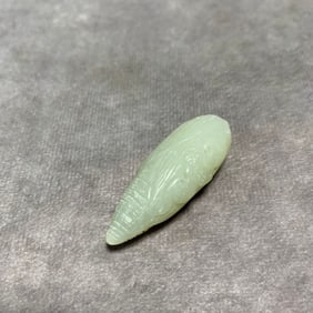 A FINE HETIAN WHITE JADE CORN SHAPED PIECE