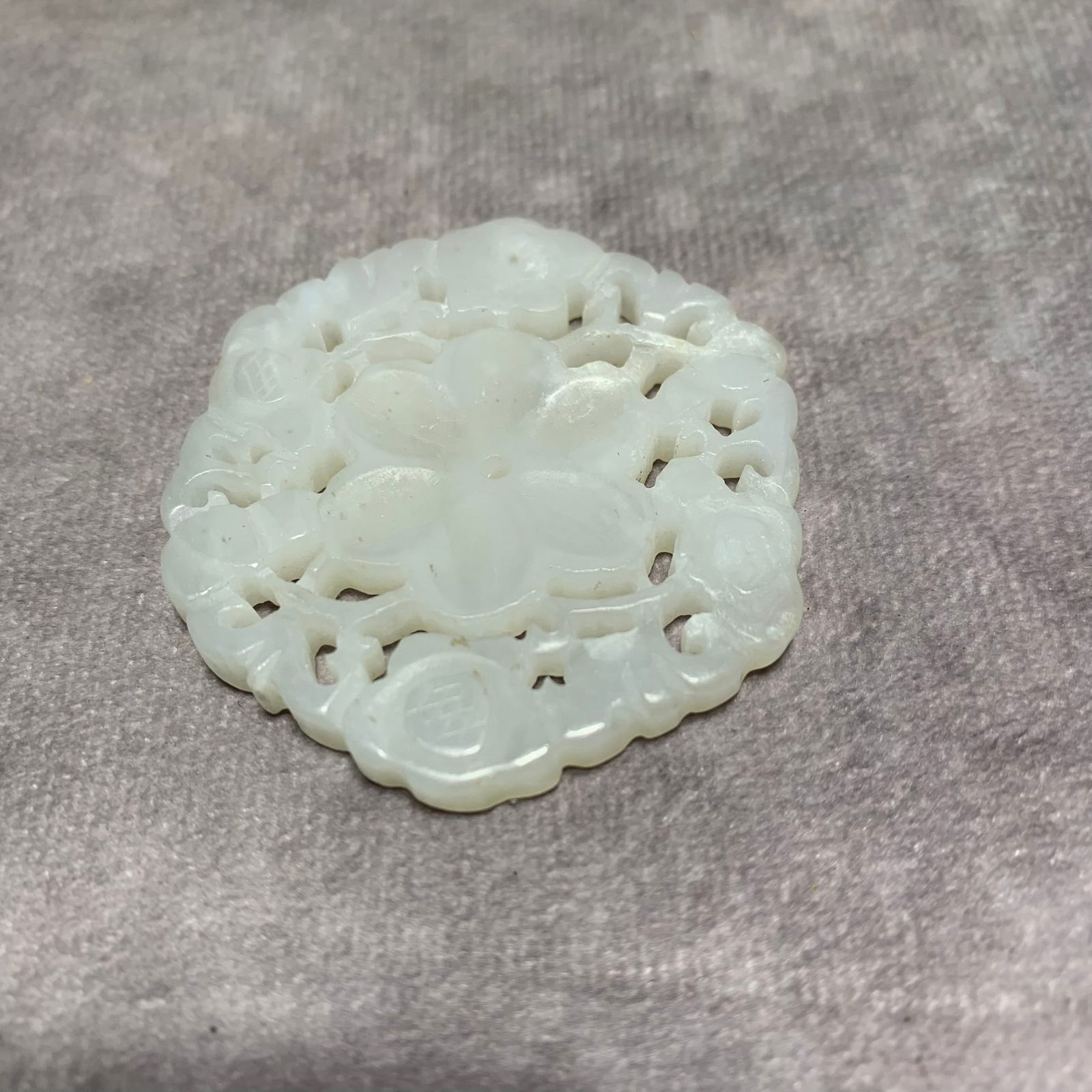 A FINE HETIAN WHITE JADE FLOWER PLAQUE (1 of 4)