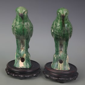 PAIR OF GREEN-GLAZED PARROT CERAMIC ORNAMENTS