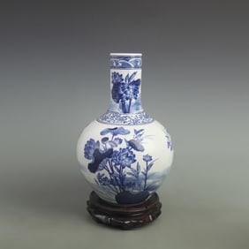 BLUE AND WHITE PORCELAIN VASE WITH LOTUS FLOWER PATTERN