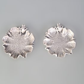 PAIR OF SILVER-PLATED SMALL PLATES