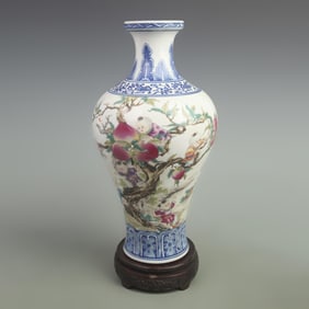 FAMILLE ROSE, BLUE-AND-WHITE NINE SONS CLIMBING PEACHES PATTERN VASE