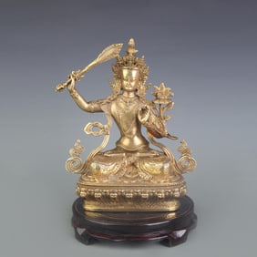 A FINE BRONZE STATUE OF MANJUSHRI BODHISATTVA