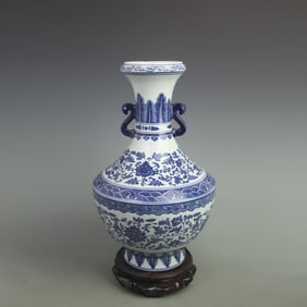 BLUE AND WHITE PORCELAIN VASE WITH ENTWINED LOTUS DESIGN