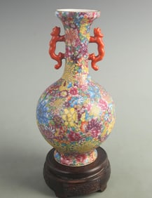 A FINE DOUBLE EARED PORCELAIN BOTTLE WITH FLORAL PATTERN