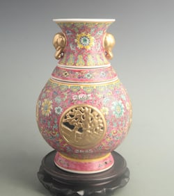 A FINE RED COLOR GLAZED PORCELAIN VASE WITH INNER REVOLVING DESIGN