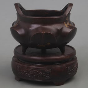 XUANDE BRONZE GILDED KUI-STYLE THREE-LEGGED INCENSE BURNER