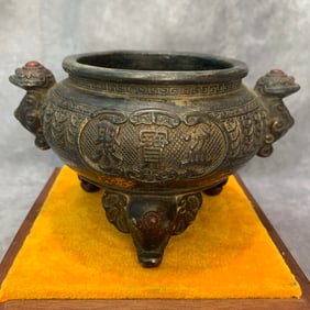 A FINE FINELY CARVED THREE LEG DOUBLE HANDLE BRONZE CENSER