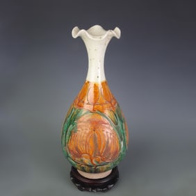 WHITE-GROUND YELLOW AND GREEN GLAZED TRUMPET-MOUTH YUHUCHUN VASE
