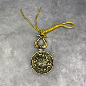 A FINE TIBETAN BUDDHIST INSTRUMENTS PENDANT