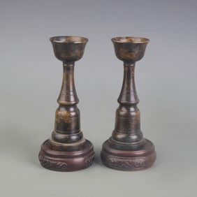 PAIR OF BRONZE CANDLE HOLDERS