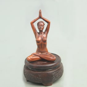 A FINE BOXWOOD CARVING IN FIGURE OF A GIRL