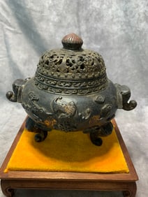 GILDED BRONZE ELEPHANT-FOOTED AND ELEPHANT-EARED INCENSE BURNER