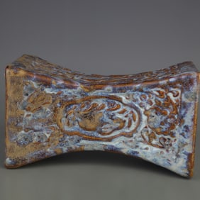 A FINE SQUARE CERAMIC PILLOW