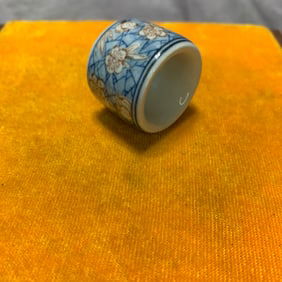 BLUE AND WHITE UNDERGLAZE RED PLUM BLOSSOM THUMB RING