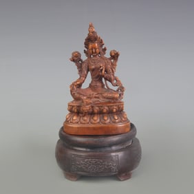 A FINE BOXWOOD GREEN TARA STATUE