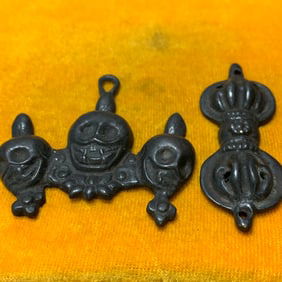 PAIR OF TIBETAN BUDDHIST METEORITE IRON RITUAL OBJECTS