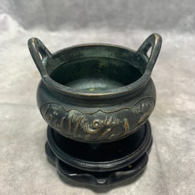 BRONZE THREE-LEGGED BRIDGE-EARED INCENSE BURNER
