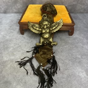 A FINE TIBETIAN BRONZE PENDANT