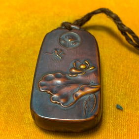 A SMALL BONE MADE BEAST PATTERN PLAQUE