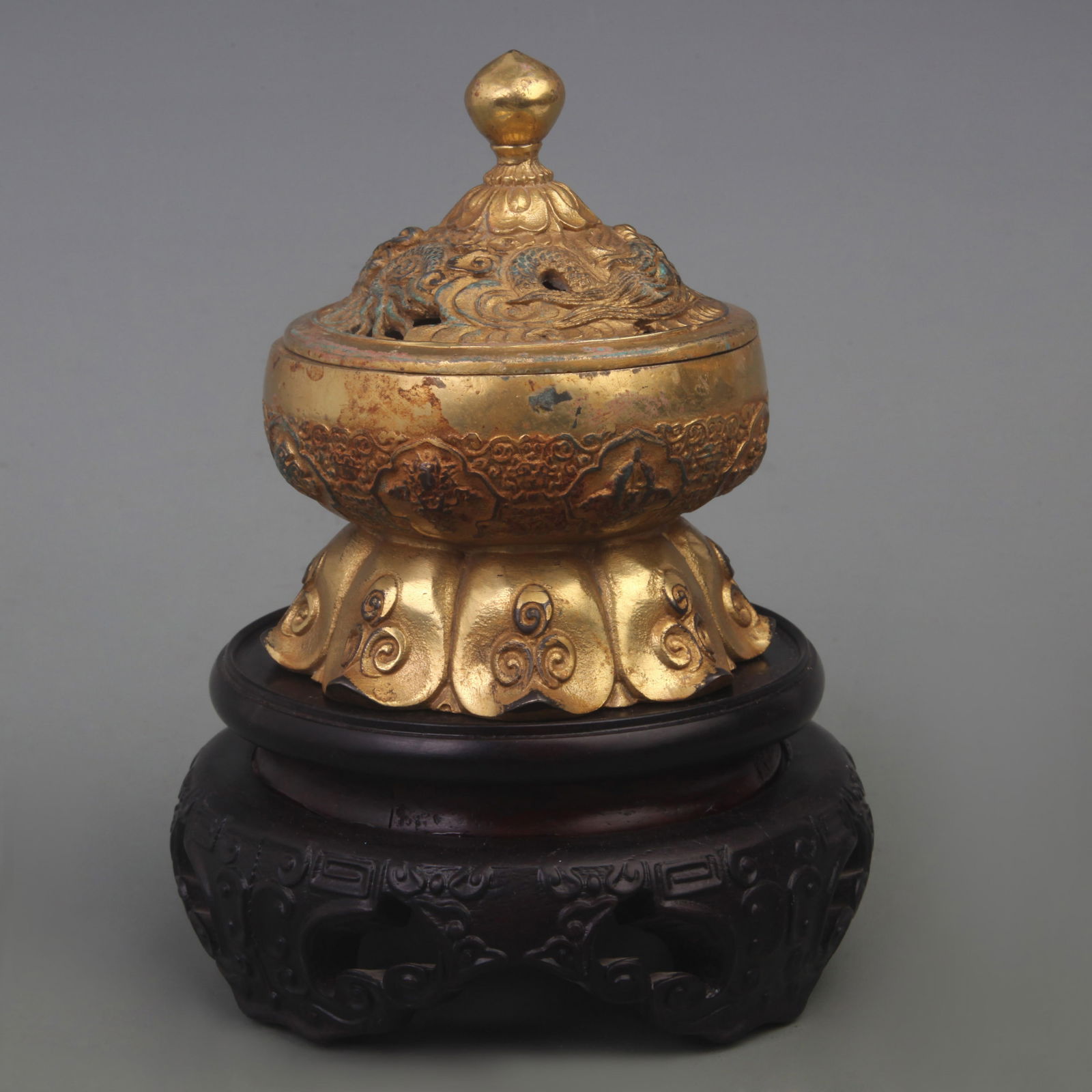 A BRONZE INCENSE BURNER WITH DRAGON AND EIGHT TREASURES PATTERN (1 of 5)