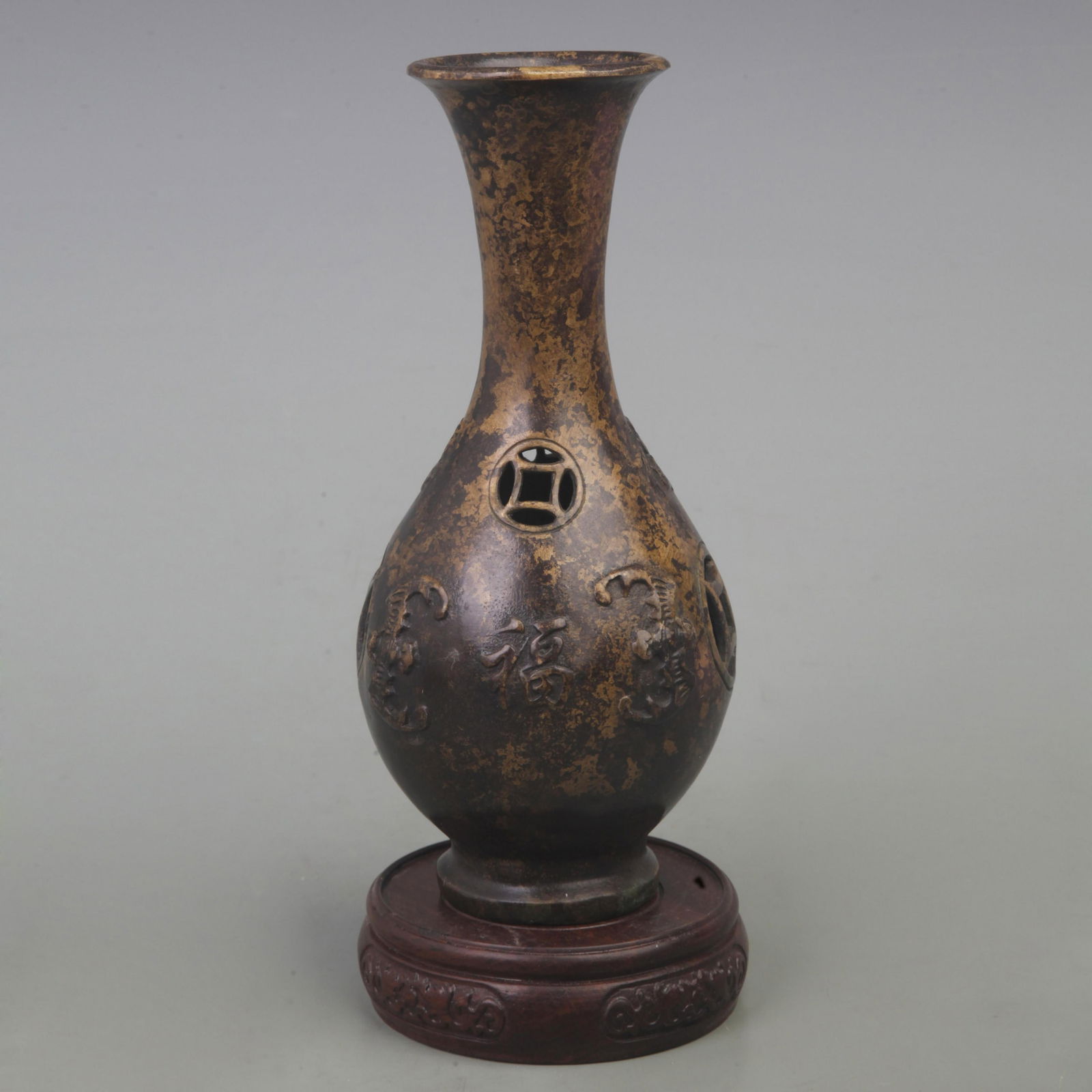 A FINE BRONZE FLOWER PATTERN BOTTLE (1 of 3)