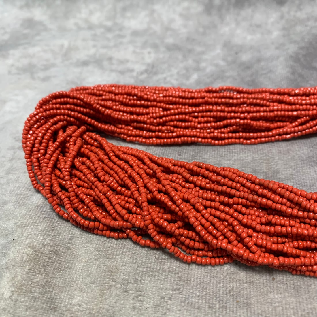 TIBETAN CORAL AND YAK BONE 40-STRAND NECKLACE: Qing Dynasty; Long: 35 inch;