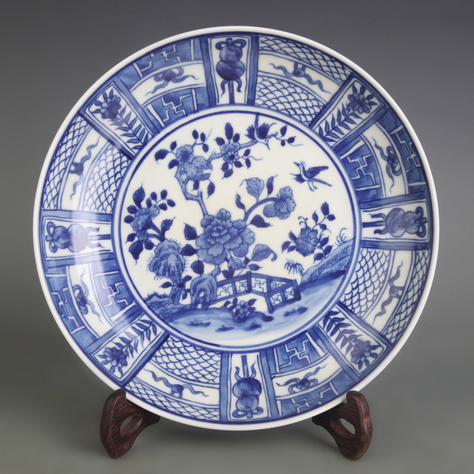 BLUE AND WHITE FLORAL AND BIRD PATTERN PORCELAIN PLATE: Qing Dynasty Kang Xi Peroid; Diameter: 8.8 inch; High: 1.8 inch