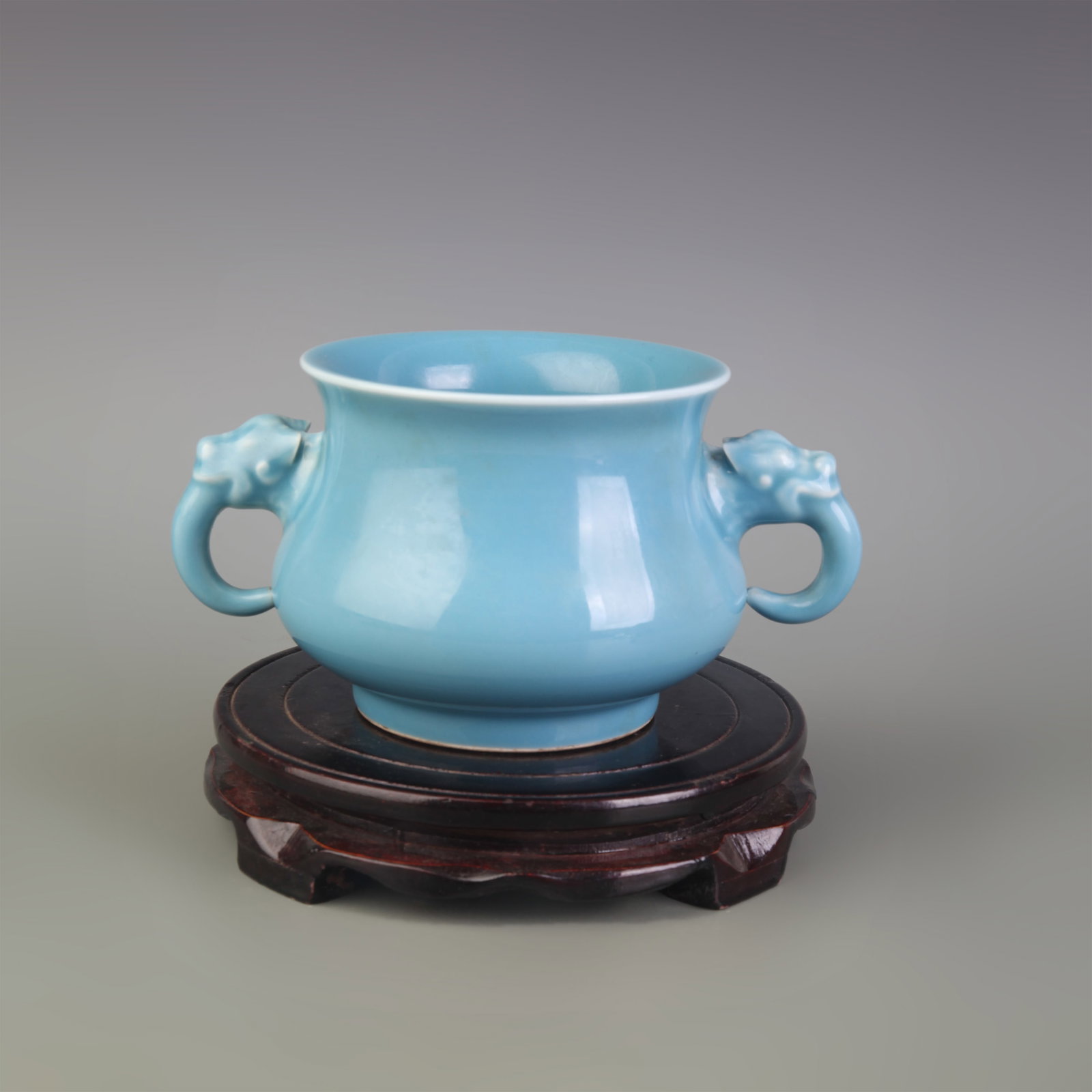 SKY BLUE GLAZE TWIN-HANDLED ROUND FOOTED PORCELAIN CENSER: Qing Dynasty Qian Long Period; Diameter: 4.7 inch; High:3.9 inch