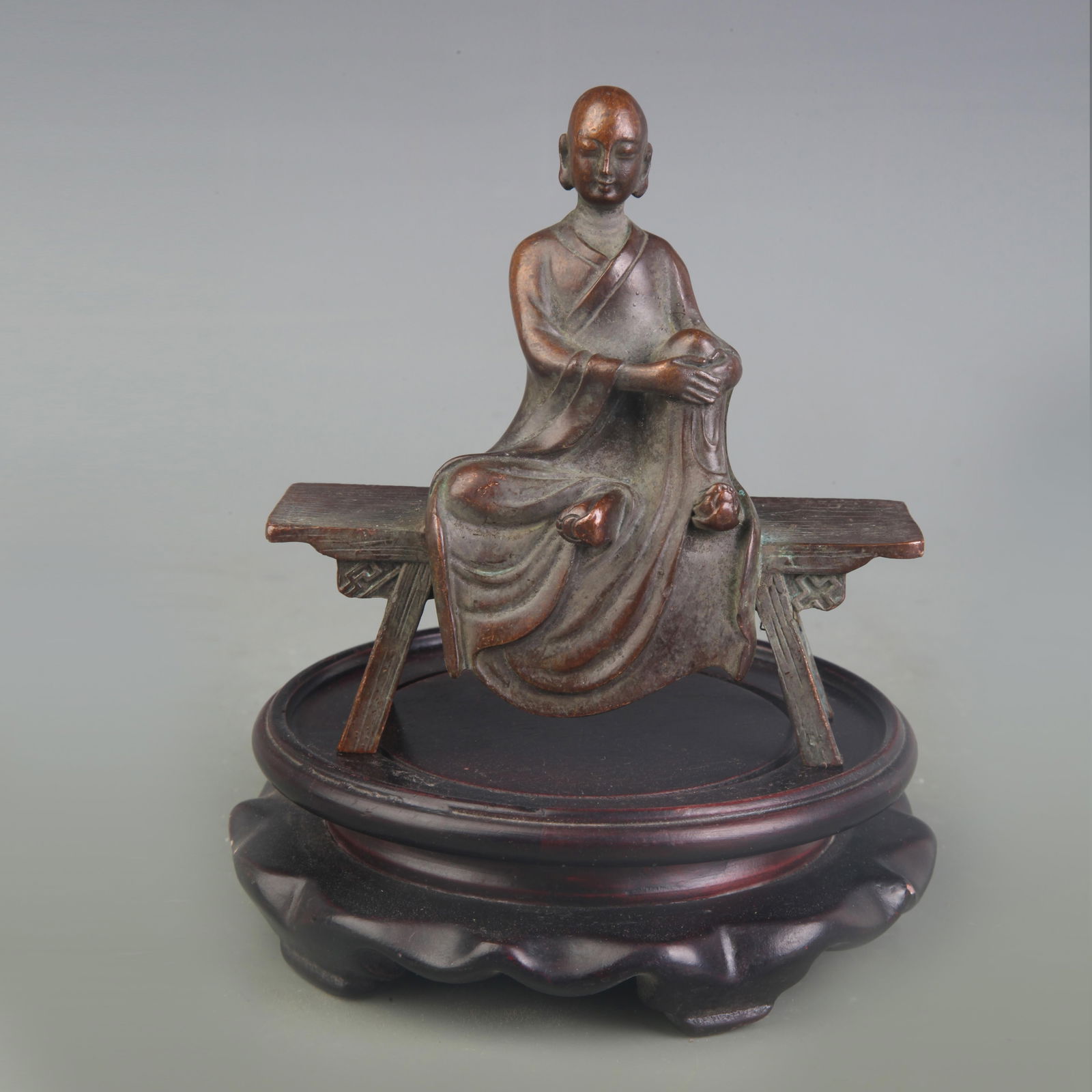 A FINE BRONZE BENCH BUDDHA (1 of 5)